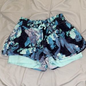 Floral patterned MPG athletic shorts